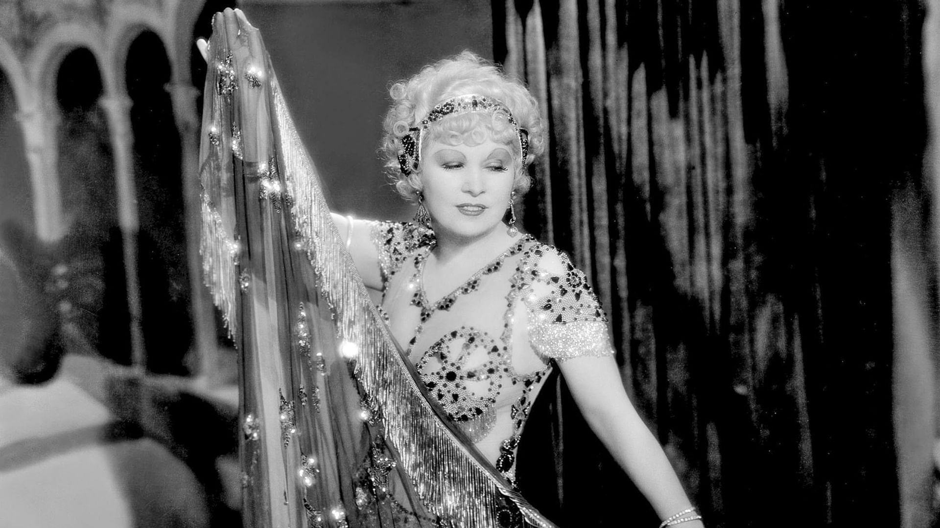 Mae West: Dirty Blonde Background