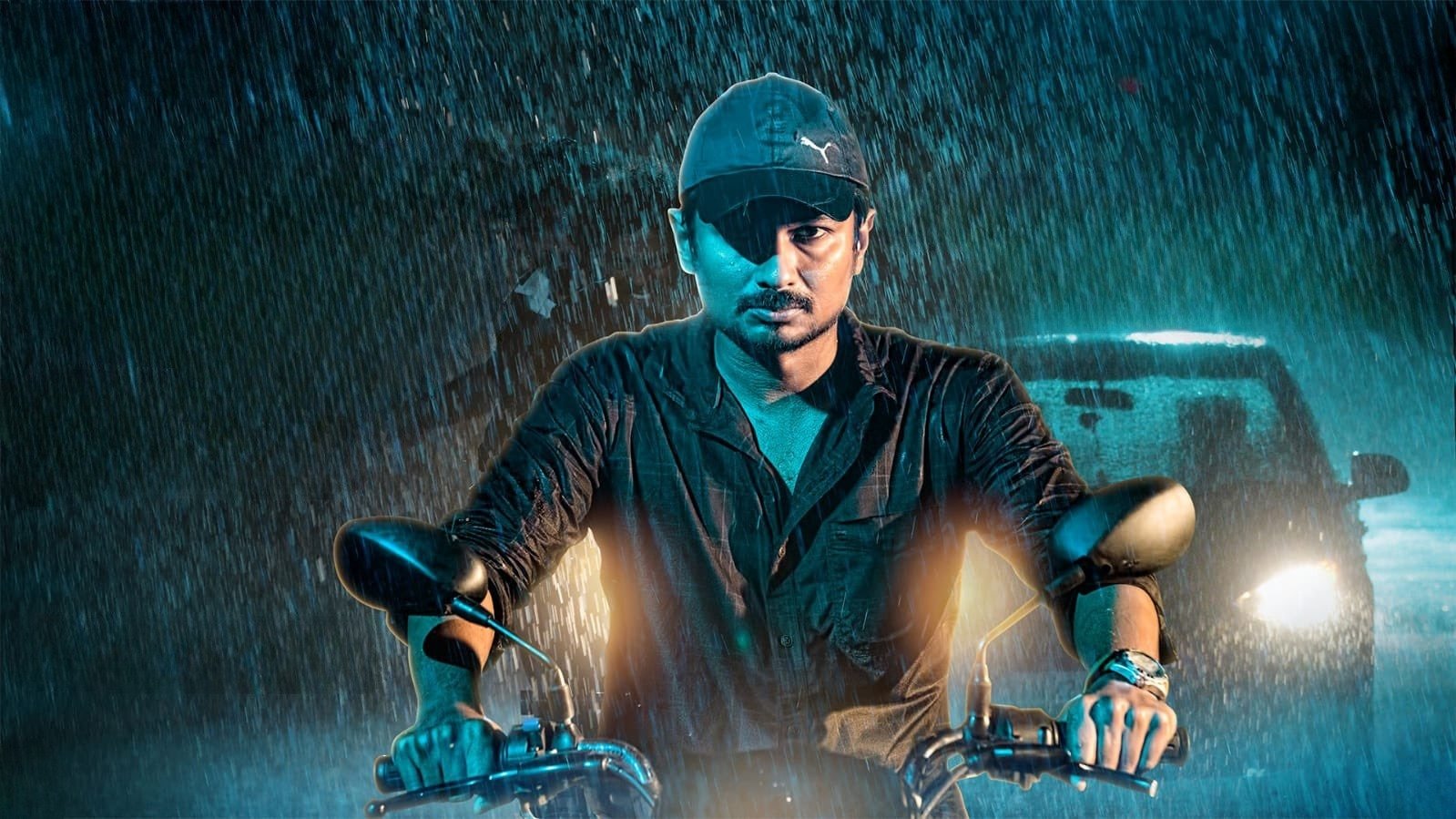 Kannai Nambathe Background