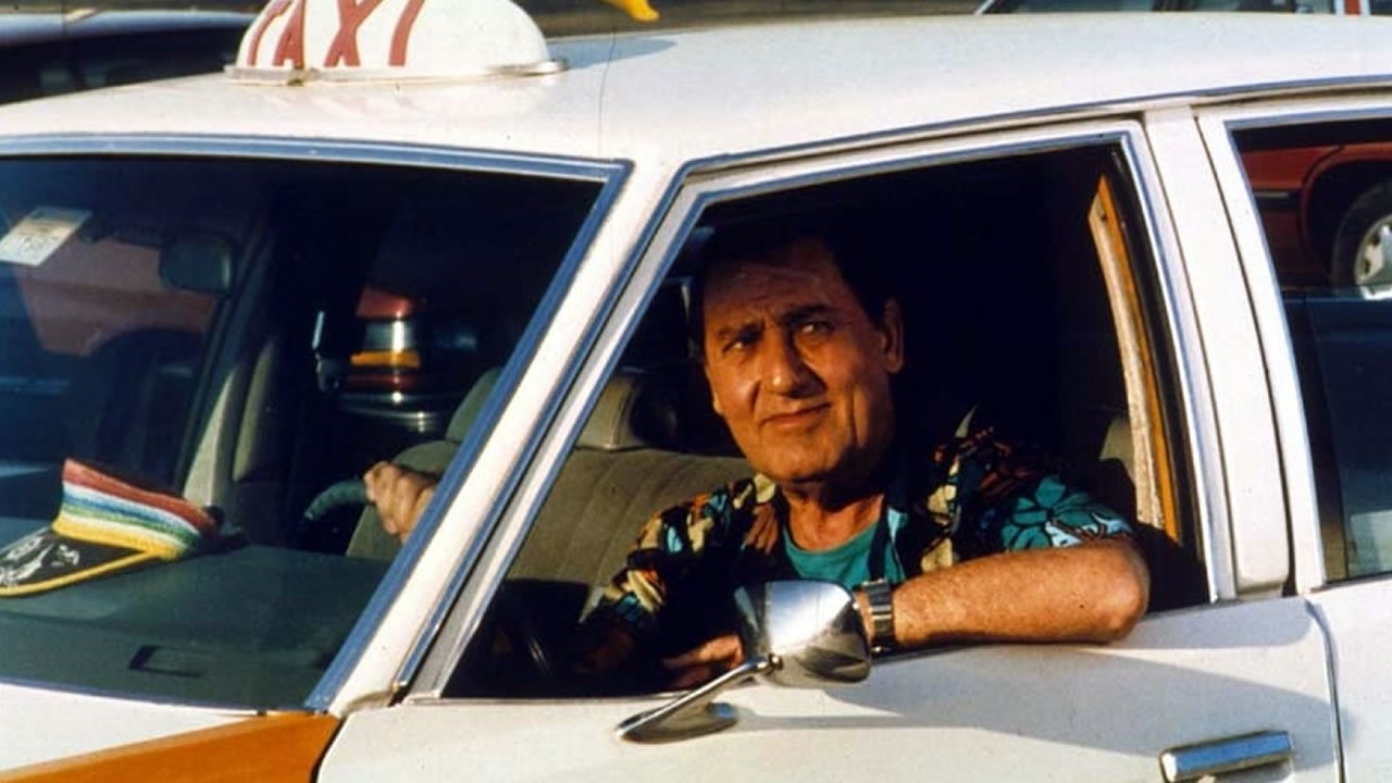 A Taxi Driver in New York Background