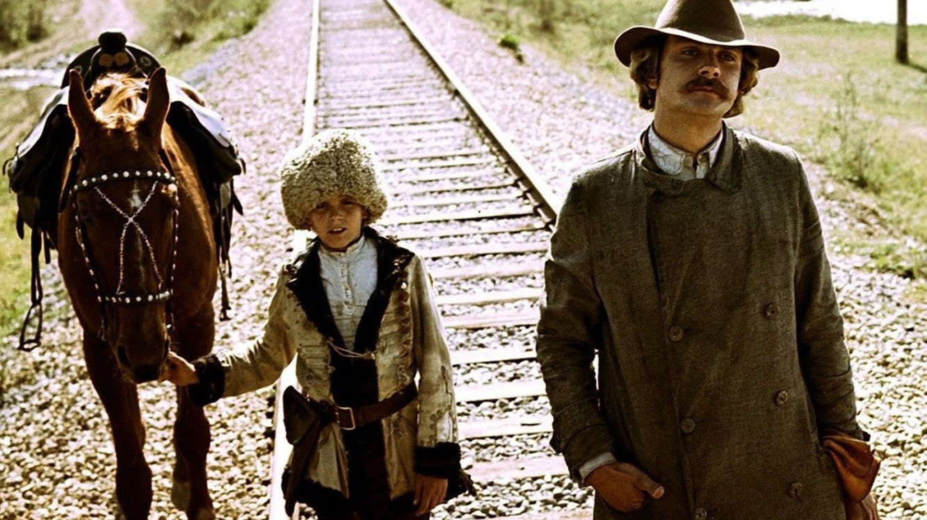 At Home Among Strangers, a Stranger Among His Own Background